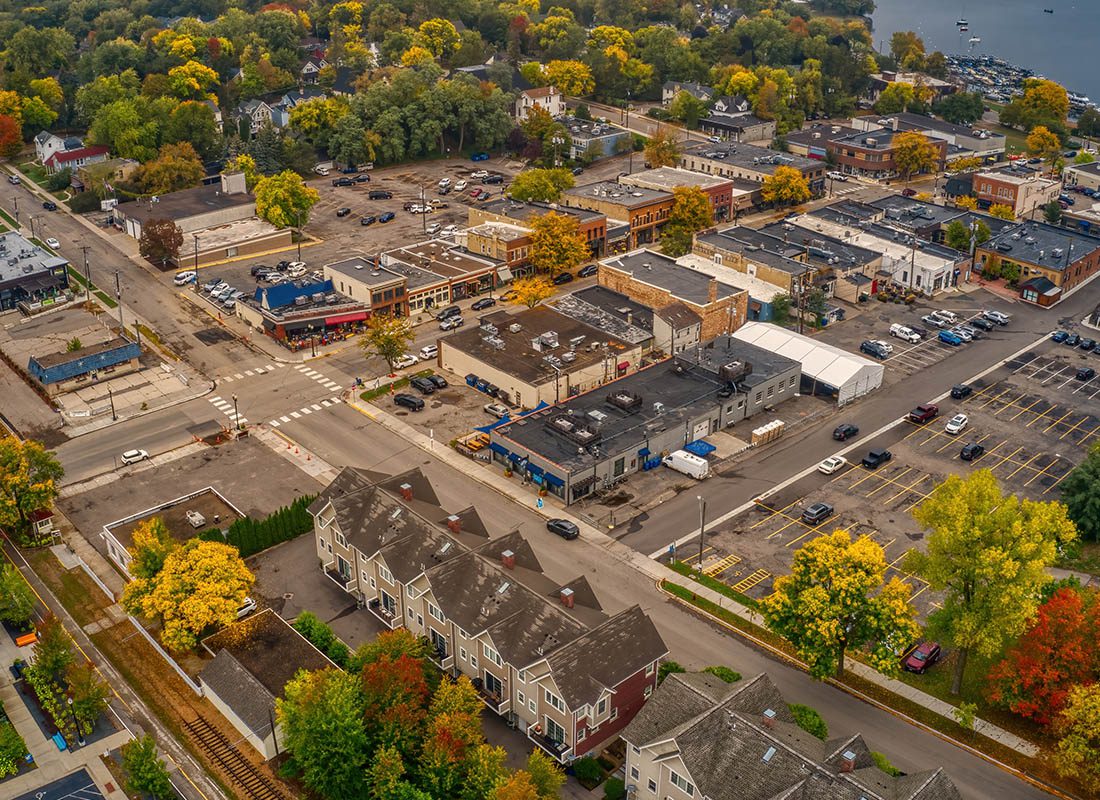 Metamora, Mi - Aeria View of a Small town With Green Trees and a Lake in the Distance